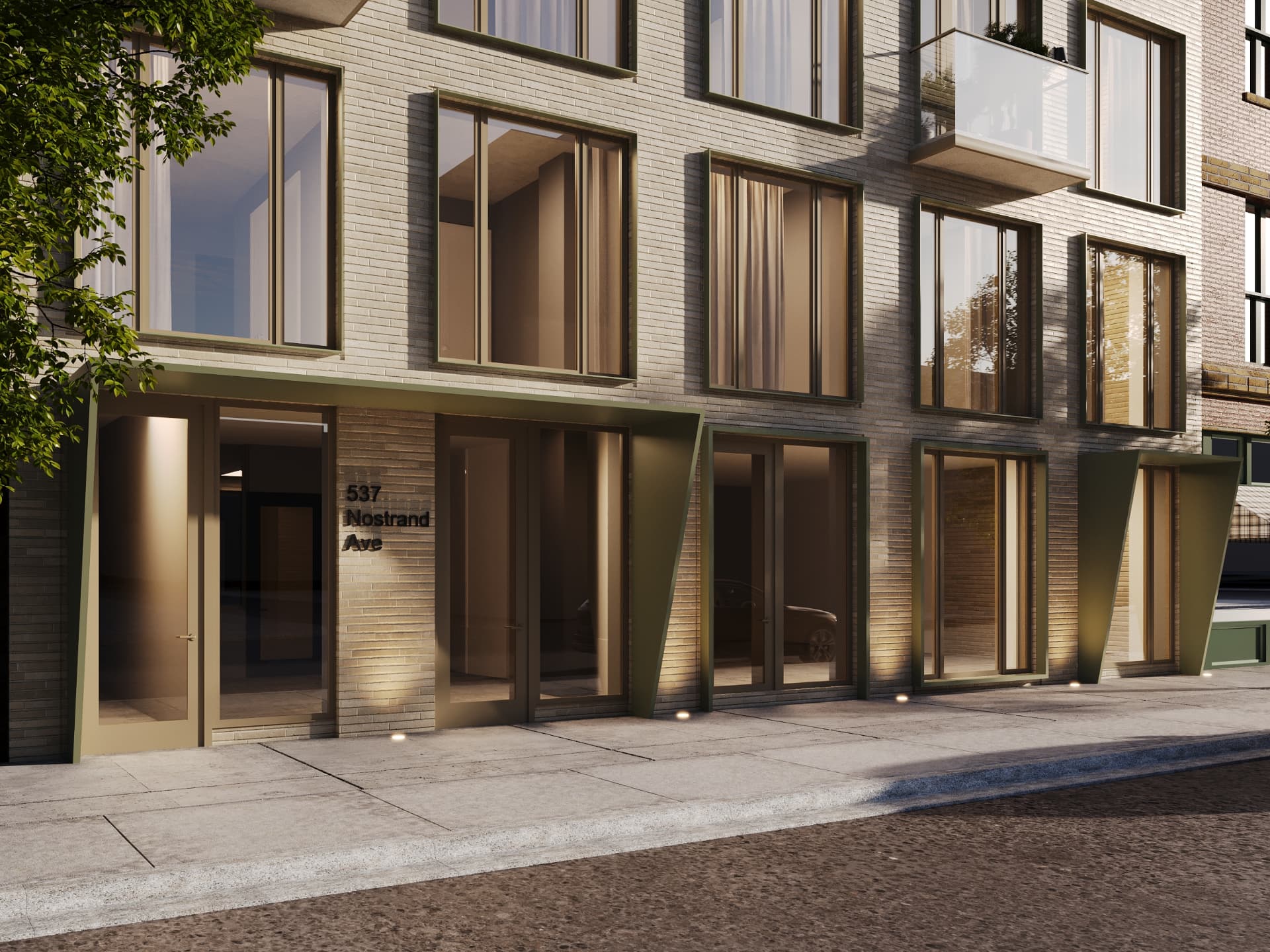 537 Nostrand Ave — ground-floor entry with olive metal fins and uplit brick