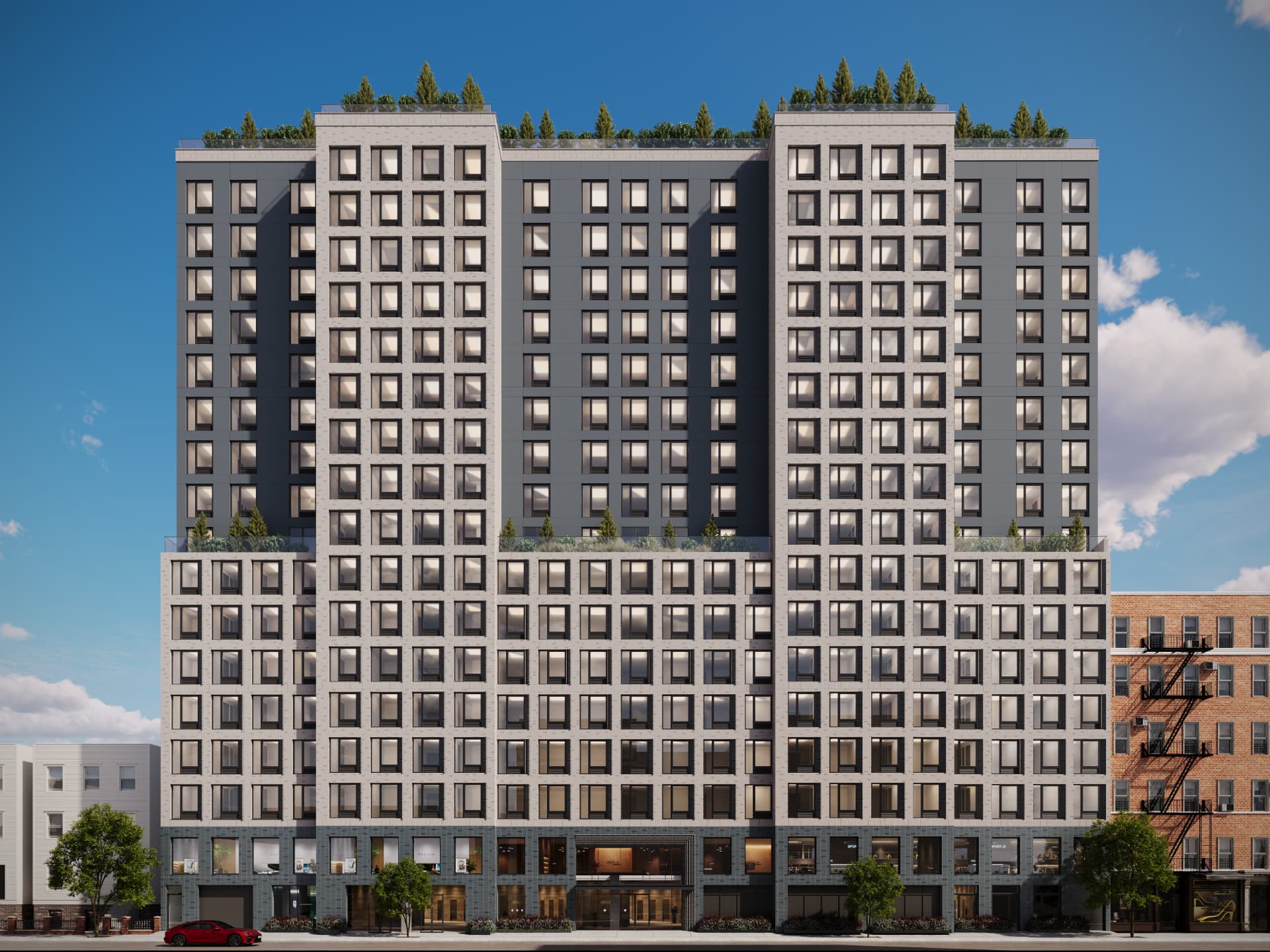 Full street elevation with pale brick massing, planted setbacks and a glazed retail base