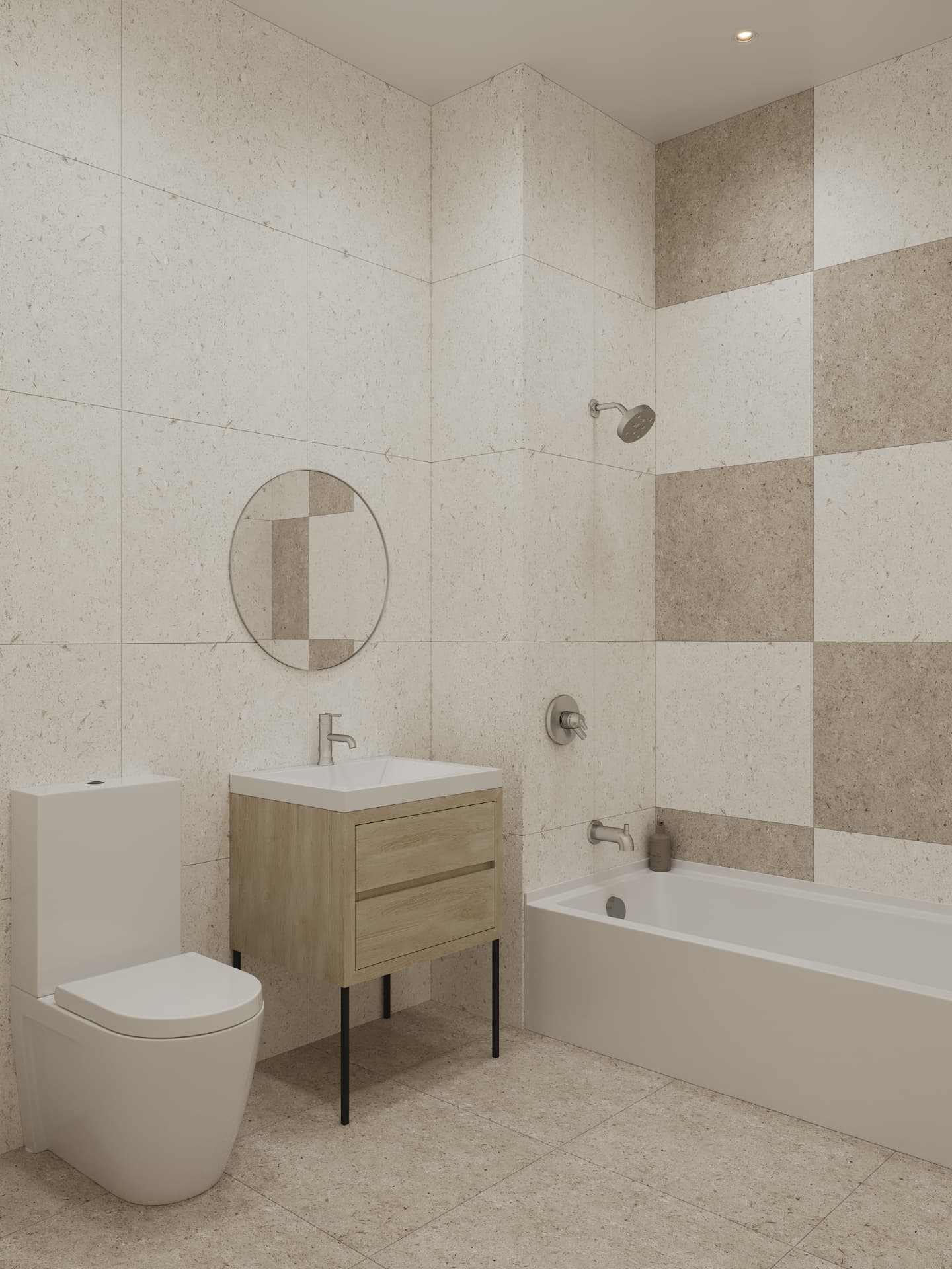Residence bathroom with checkerboard limestone tile, oak vanity and round mirror