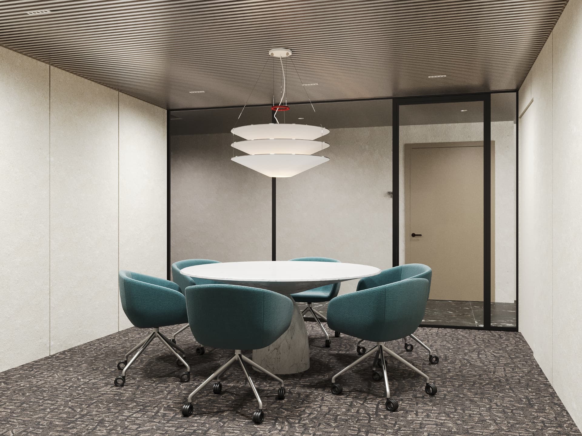 Glass-enclosed meeting room with round marble table and teal chairs