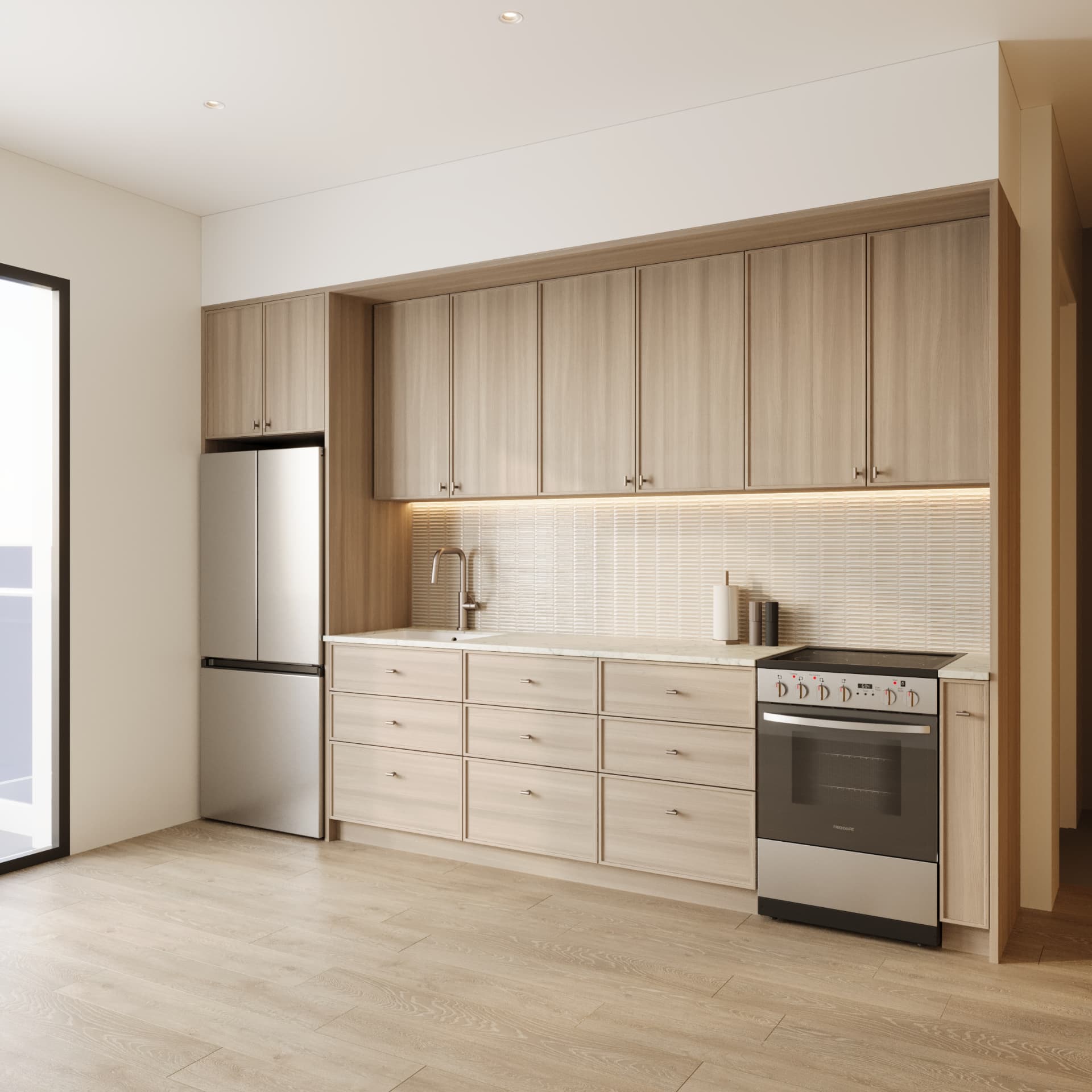 Residence kitchen with pale oak cabinetry and stone counters