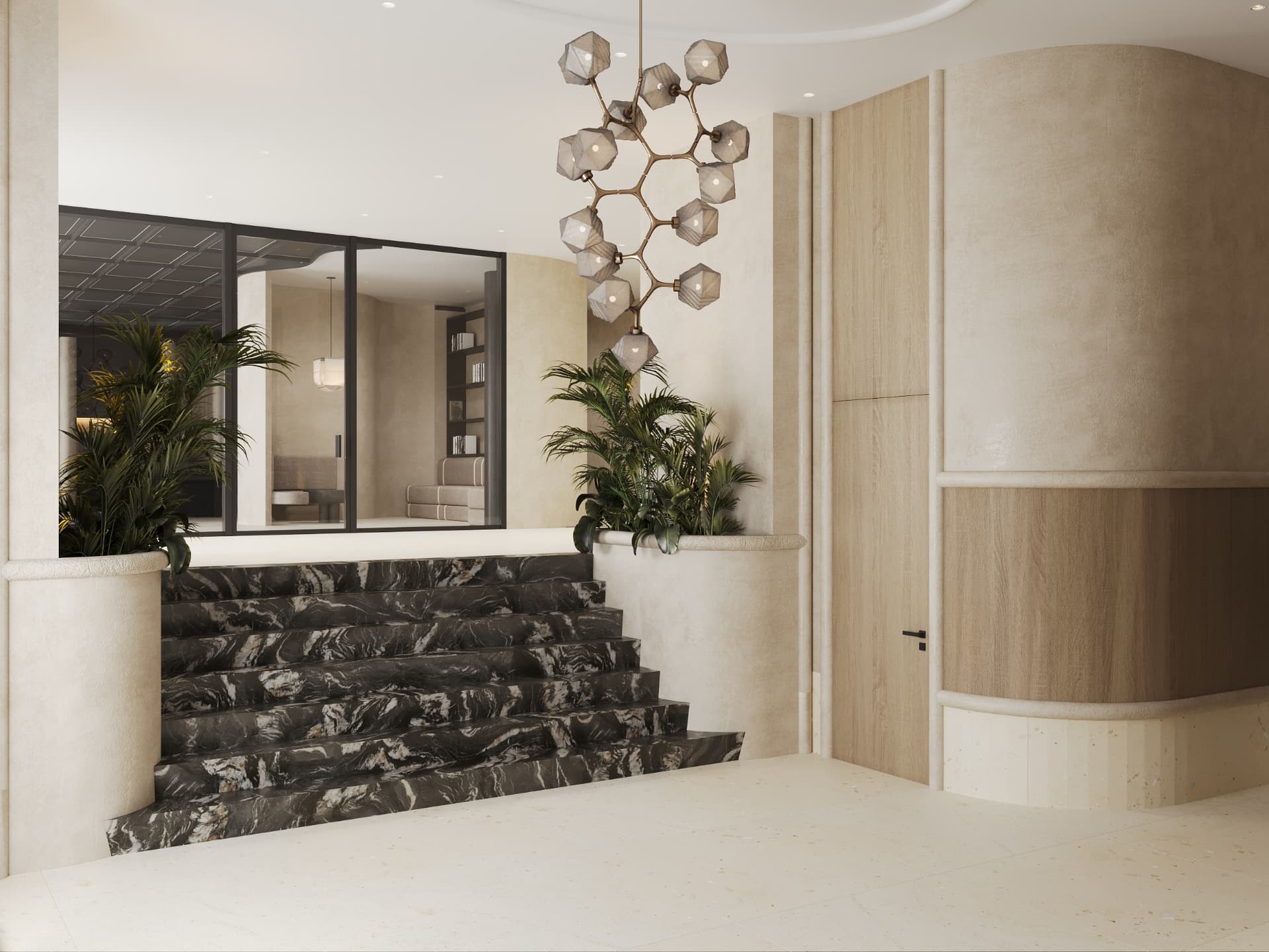 Lobby with black marble stair and sculptural chandelier