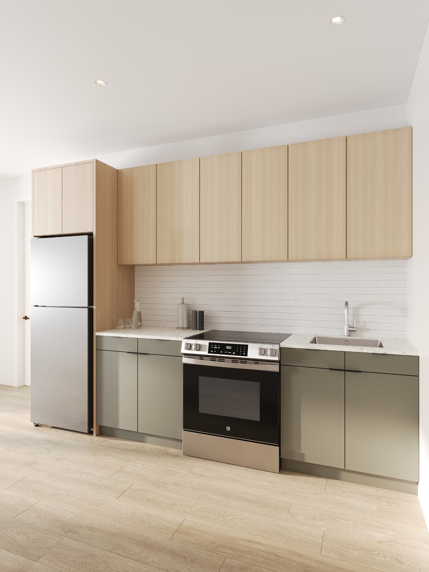 Residence kitchen with pale oak uppers, olive base cabinetry and terrazzo counters