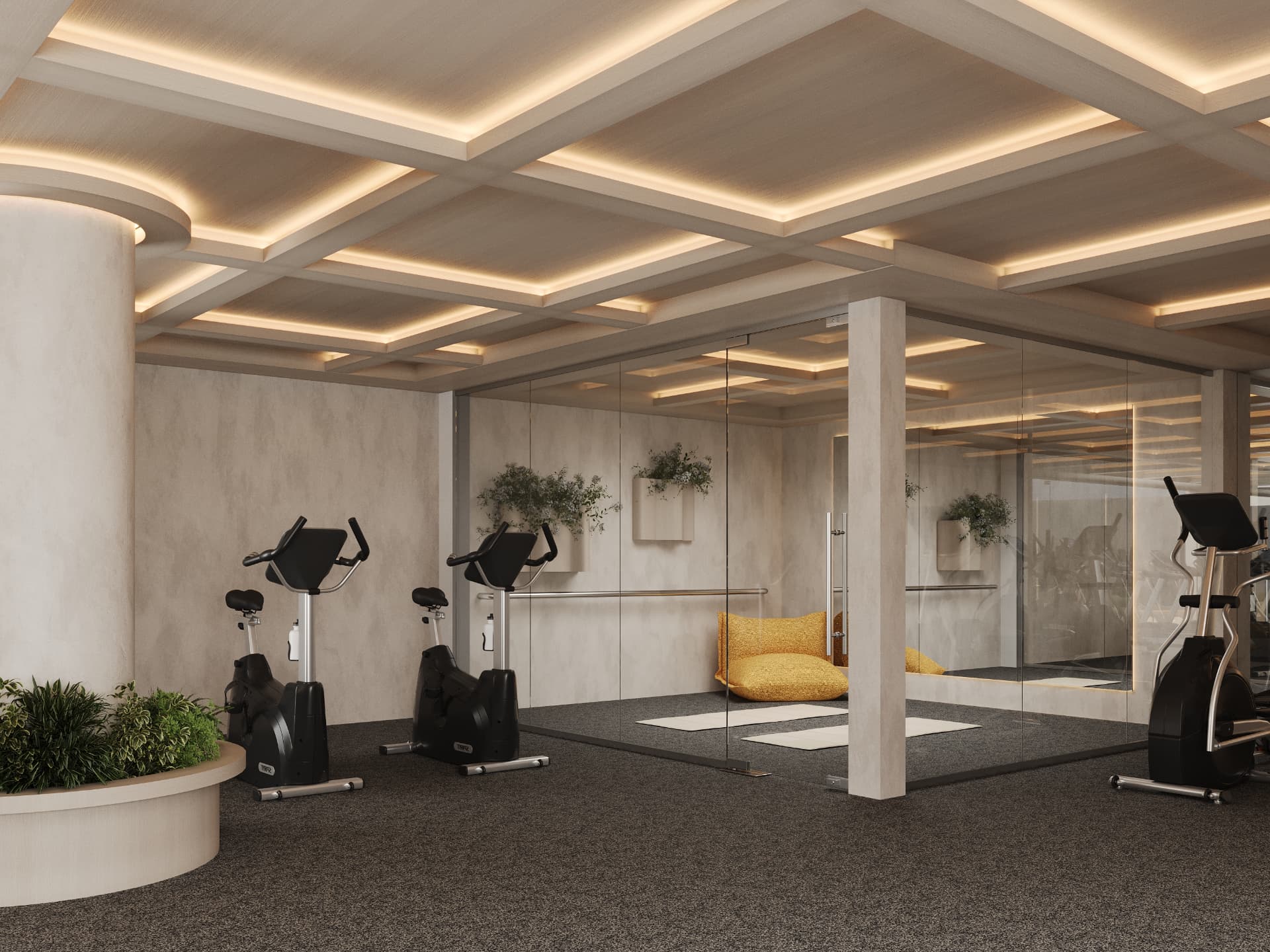 Fitness room with coffered lit ceiling and glazed yoga studio beyond