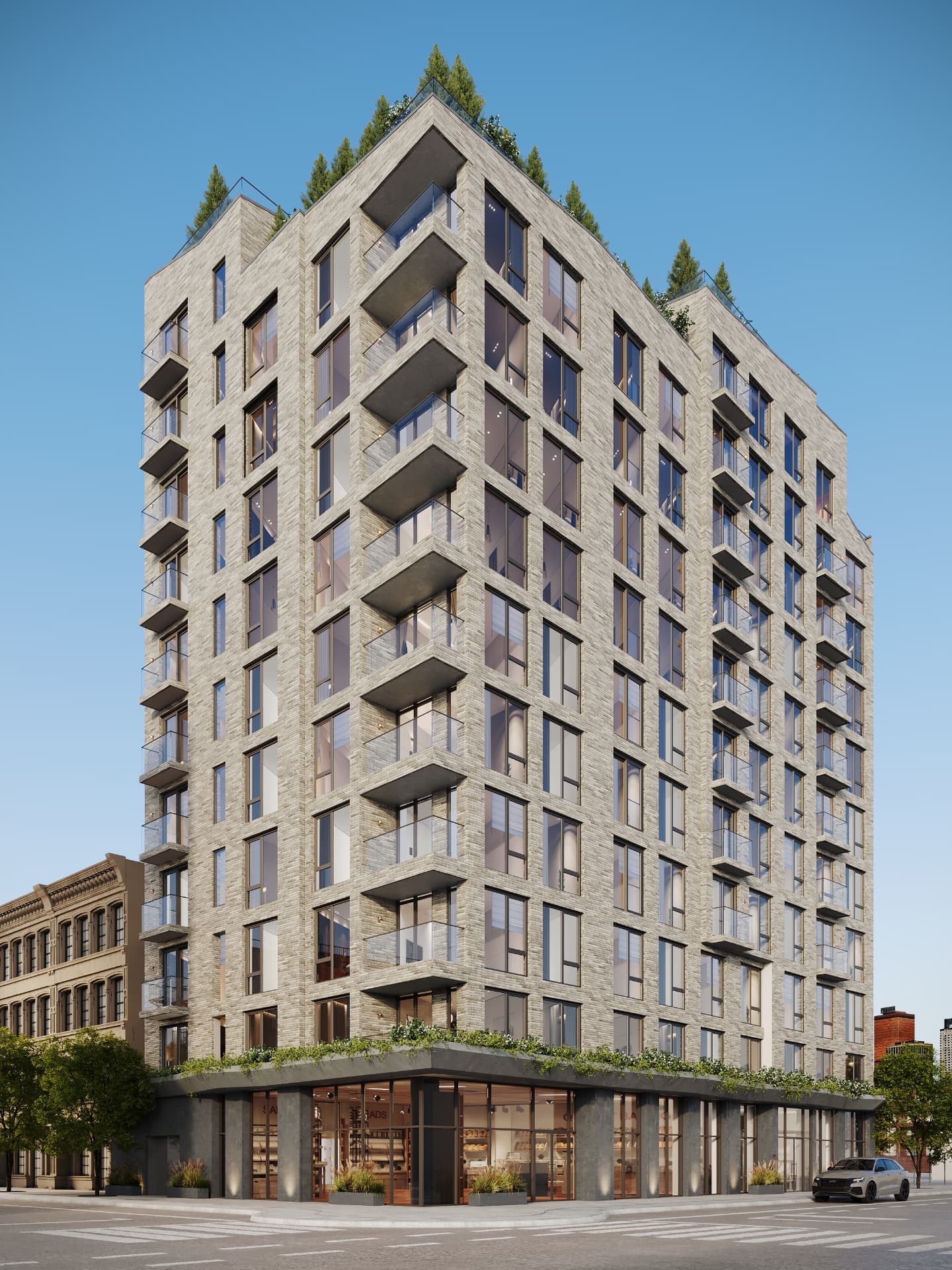 Corner view of the building with balconies and planted roof terraces