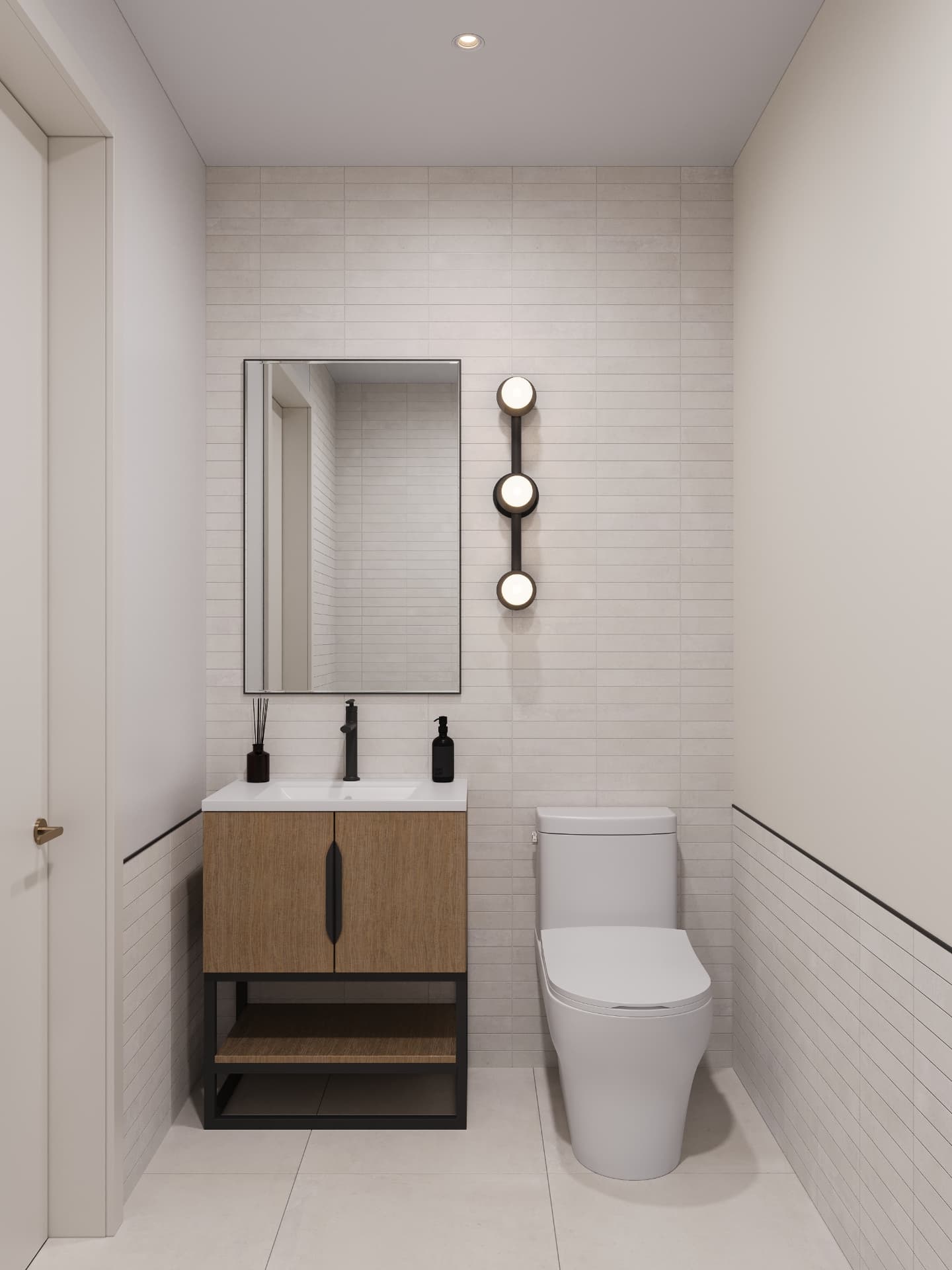 Powder room with stacked ceramic tile, oak vanity and triple globe sconce